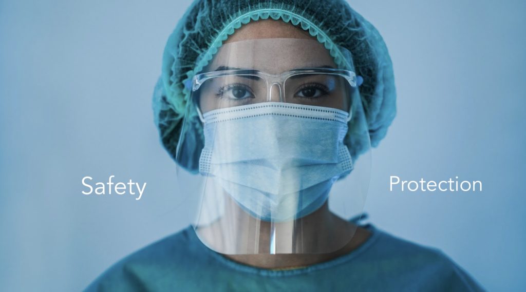 Person in medical scrubs and masked